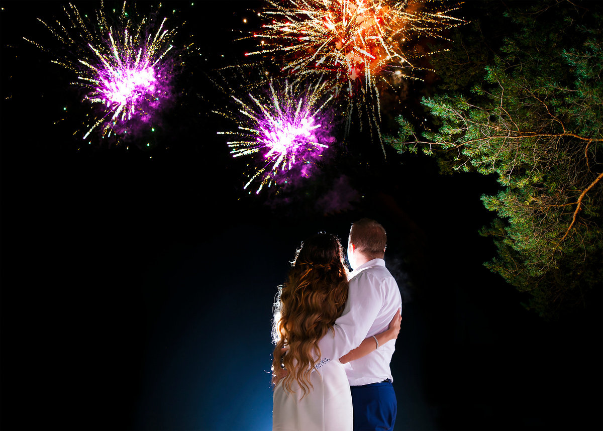 Romantic Couple Looking at the Fireworks 